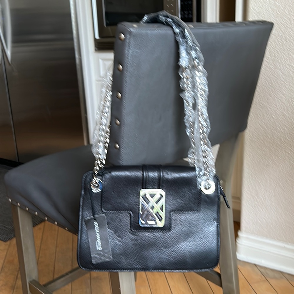 Joelle Hawkens brand new leather bag with slight‎ imperfections.